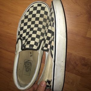 Checkered Vans slip ons